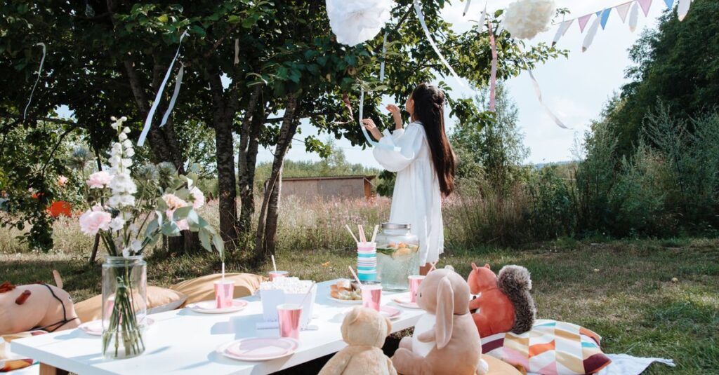Child's outdoor birthday party with picnic setup and decorations.