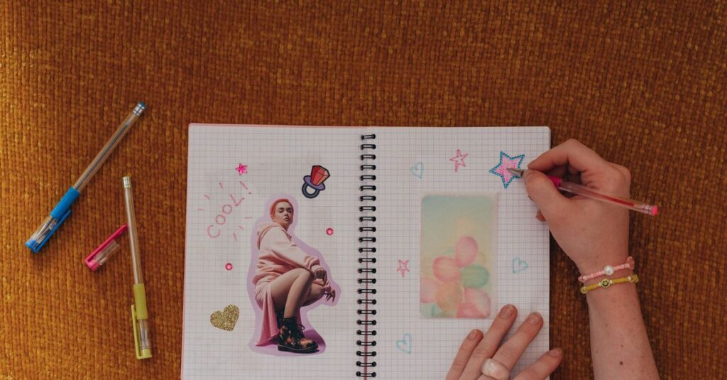 Colorful flat lay of a craft journal with creative doodles and stickers.