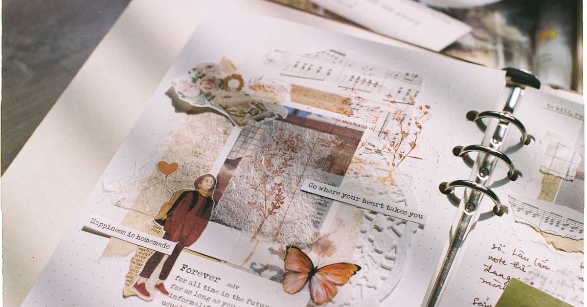 A beautifully decorated scrapbook page with vintage elements and inspiring quotes.