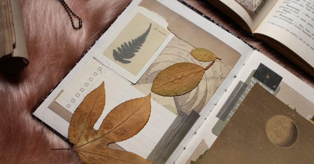 A creative flatlay of vintage scrapbooks with autumn leaves, capturing a nostalgic fall ambiance.