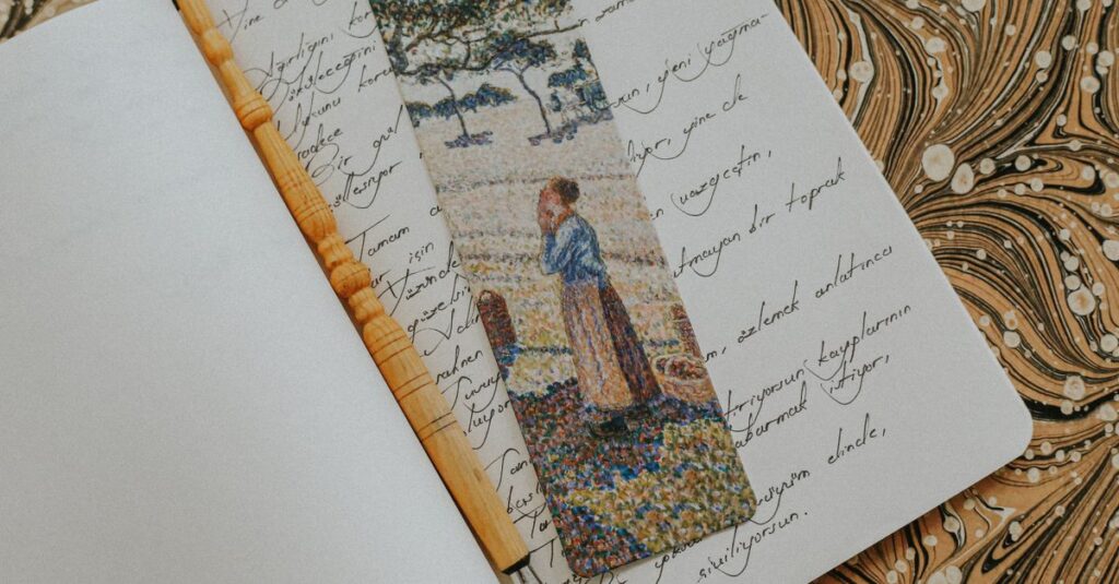 Open journal with elegant pen and artistic bookmark on vintage-patterned paper.