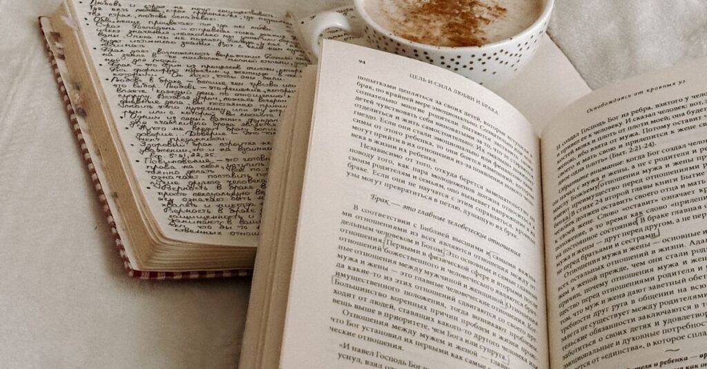 An inviting scene of an open book with a coffee mug and journal on a cozy surface.